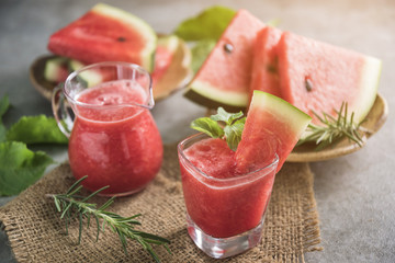 Watermelon drink in glasses with slices of watermelon