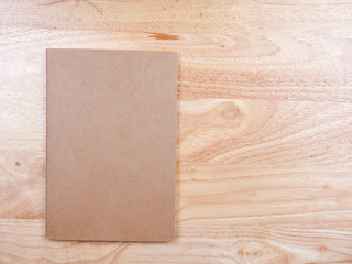 Recycled paper book on wooden background