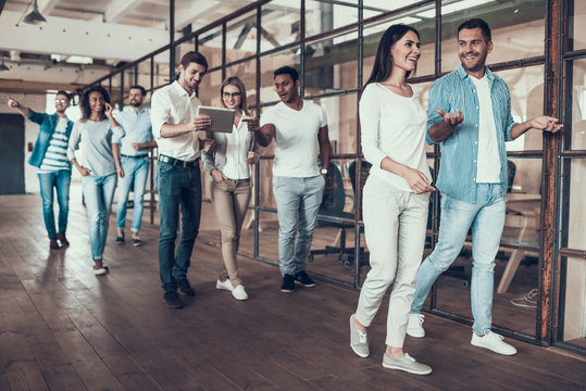 Group of Young Business People Walking Together