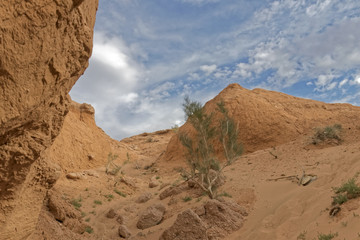 A rocky corner against a blue sky