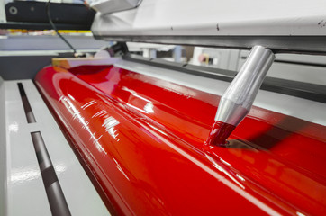 Offset press machine in printing house