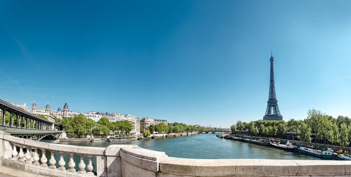 Panorama of Eiffel Tower with Bir Hakeim bridge and The Seine River in Paris, France