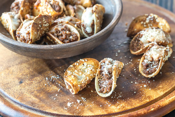 Mini tacos with ground beef and cheese