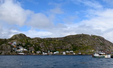 Fototapeta na wymiar view across the harbour towards Signal Hill and the Battery neighborhood, St John's Newfoundland Canada