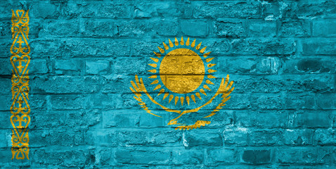 Flag of Kazakhstan over an old brick wall background, surface
