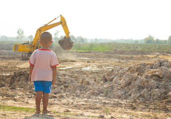 boy and backhoe