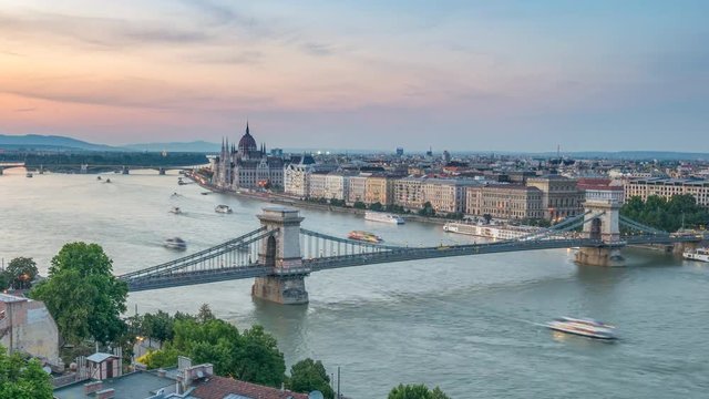Budapest Hungary time lapse 4K, city skyline day to night timelapse at Danube River