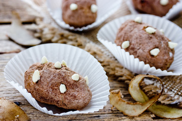 Traditional russian cake kartoshka chocolate truffle potatoes. Rum balls of vanilla biscuit with cocao powder and butter cream