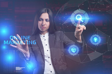 The concept of business, technology, the Internet and the network. A young entrepreneur working on a virtual screen of the future and sees the inscription: Online marketing