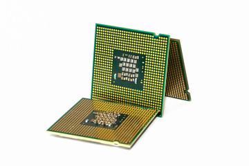 Several CPUs are leaning against each other on an isolated white background
