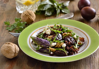 Black rice, arugula, sun-dried plums, walnuts and feta, salad.