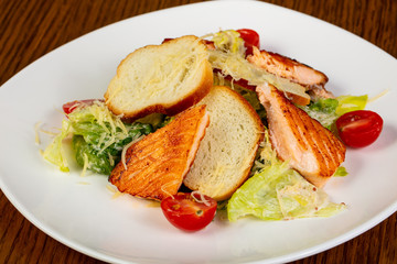 Caesar salad with salmon