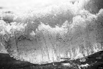 melting ice in black and white