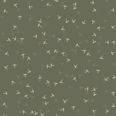 UFO military camouflage seamless pattern in in different shades of green and beige colors