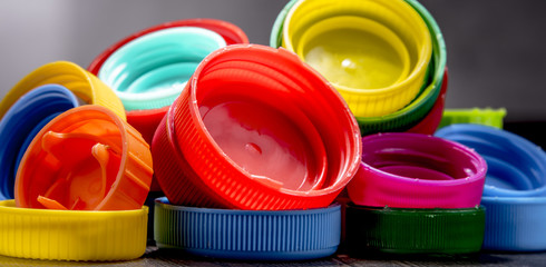 Composition with colorful plastic bottle caps