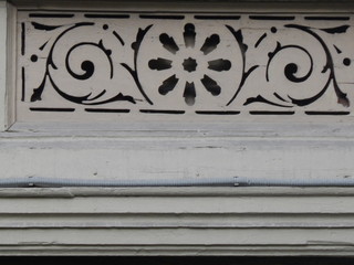Fragment of a beautiful old wooden summer house with carvings