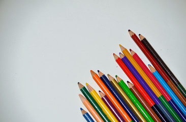 Full Set of Color Pencils on School Drawing Notebook