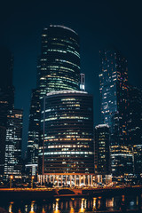 Skyscrapers. Urban view. Moscow business center. Cityscape at night.
