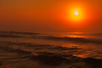 Beatiful red sunset over sea surface