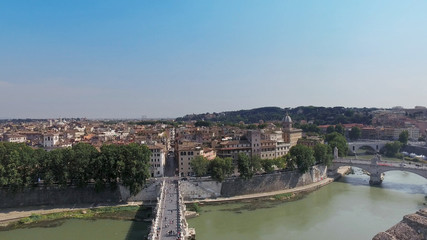 Fototapeta na wymiar Aerial view on Tiber river with bridges St. Angelo and Vittorio Emanuele II in Rome, Italy