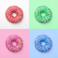 Set of colorful donuts in icing on a colored background. Excellent fresh delicious purple green...