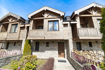 Traditional wood and stone house architecture background