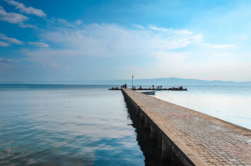 Obraz premium Summer, Travel, Vacation and Holiday concept - Concrete pier