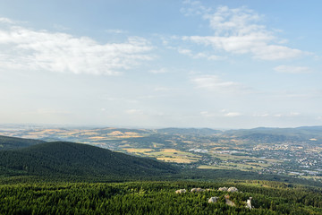 Obraz premium Czech landscape viewed from Jested hill near Liberec city at summer evening sunset 50 years after soviet occupation of Czechoslovakia 1968