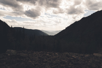 Cloudy landscape view looking towards Vail, Colorado. 