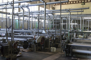 Fototapeta na wymiar Polyethylene filament production at the plant, automated work of machine tools