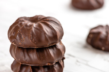 dark chocolate-coated zefir view isolated on white background food dessert