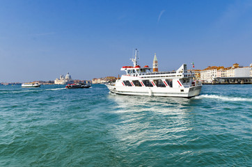 Vessels yacht boat cruising near San Marco square on Canal Grande in Venice, Italy