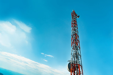 Radio transmitters,Cell phone antenna and communication towers with blue sky background