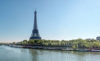 Paris cityscape - Eiffel Tower, bridge and Seine river