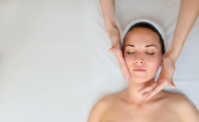 Fototapeta na wymiar Spa procedure of face massage.