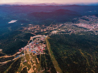 Sheregesh, Kemerovo, Russia, Aerial view drone mountains and forest, ski resort
