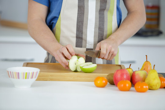 cutting apple on the cutting board