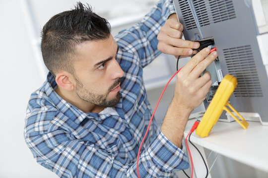 electrician specialist inspect voltage