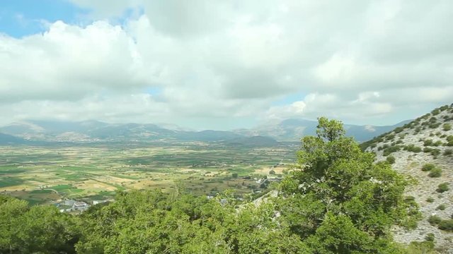 Beautiful mountain landscape against a blue sky with white clouds. Greece