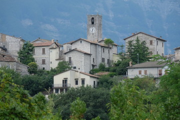Fototapeta na wymiar Detail view over the ancient village of Paggese with the main church, Piceno county, Acquasanta Terme, Marche region, Italy