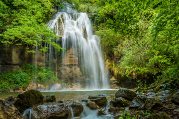 Naklejka na ściany i meble Beautiful waterfall (Salt del Roure, Catalonia, Spain, Garrotxa Province)