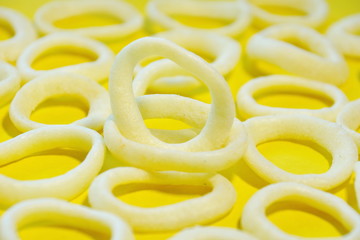 onion rings onion rings on a yellow background.