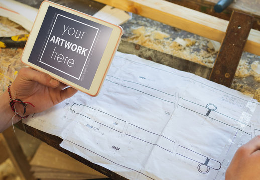 Tablet near Blueprints Mockup