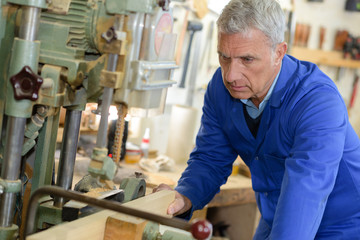 Elderly factory worker