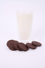 Milk with biscuit isolated on white background