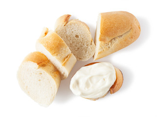 Tosten French bread, baguette, with cream cheese. Isolated on a white background. Top view.