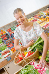 Woman buying some radishes