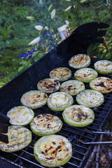 cooking homemade vegetable  vegetarian barbecue  on charcoals grill in summer garden 