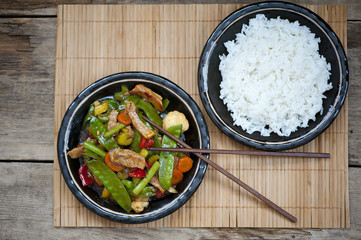 chinese stir fry in wok with beef and vegetables