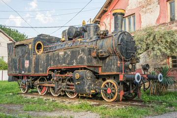 Fototapeta na wymiar Old Yugoslavian train near old rail station